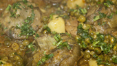 Chicken with artichoke heart and pea tajine